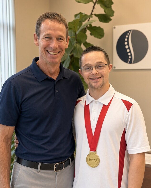 Blaine, Osceola County Special Olympics Athlete of the Year, with Dr. Bryon Moore at Kissimmee Family Wellness Center